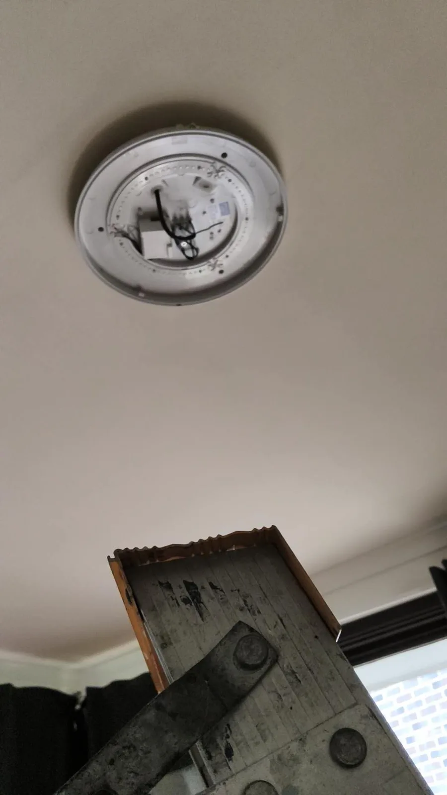 Recessed light fitting during interior electrical work